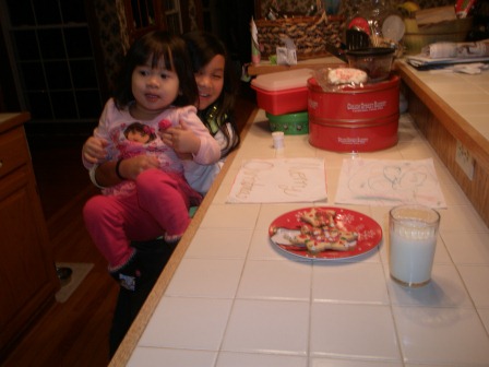 Kasen and Karis with cookies for Santa